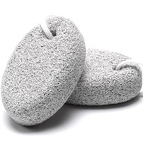 Gently exfoliating corns with a pumice stone and moisturizing the affected area can help treat foot corns naturally.